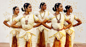 Female @rangolidancecompany dancers posed looking to the right.