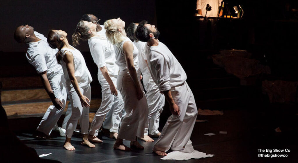 Dancers from @thebigshowco company leaning away and looking upwards.